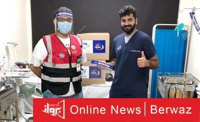 فريق تطوعي في الكويت يوزع كمامات طبية لمواجهة جائحة كورونا