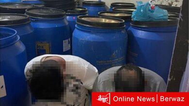 شخصين من جنسية آسيوية يديران مصنعاً للخمور في منطقة السالمية