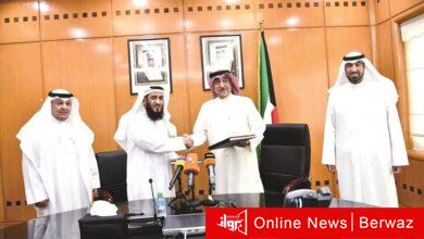 الشيخ محمد اليوسف وفريد عمادي خلال توقيع البروتوكول